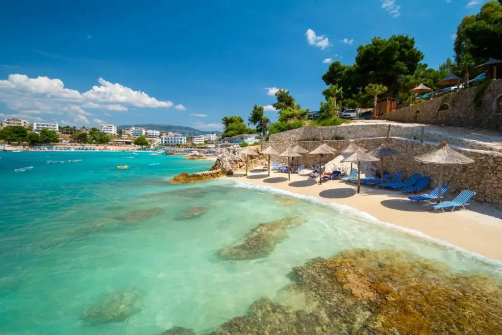 beach with umbrellas in ksamil