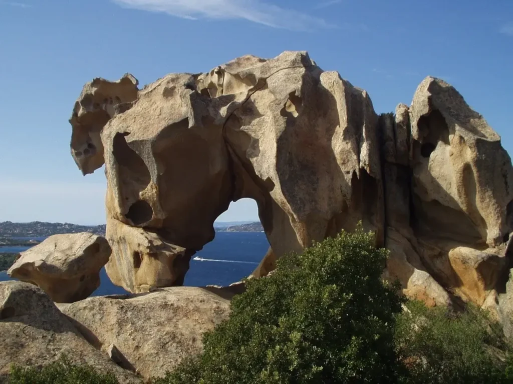 a large rock formation with a hole in the middle